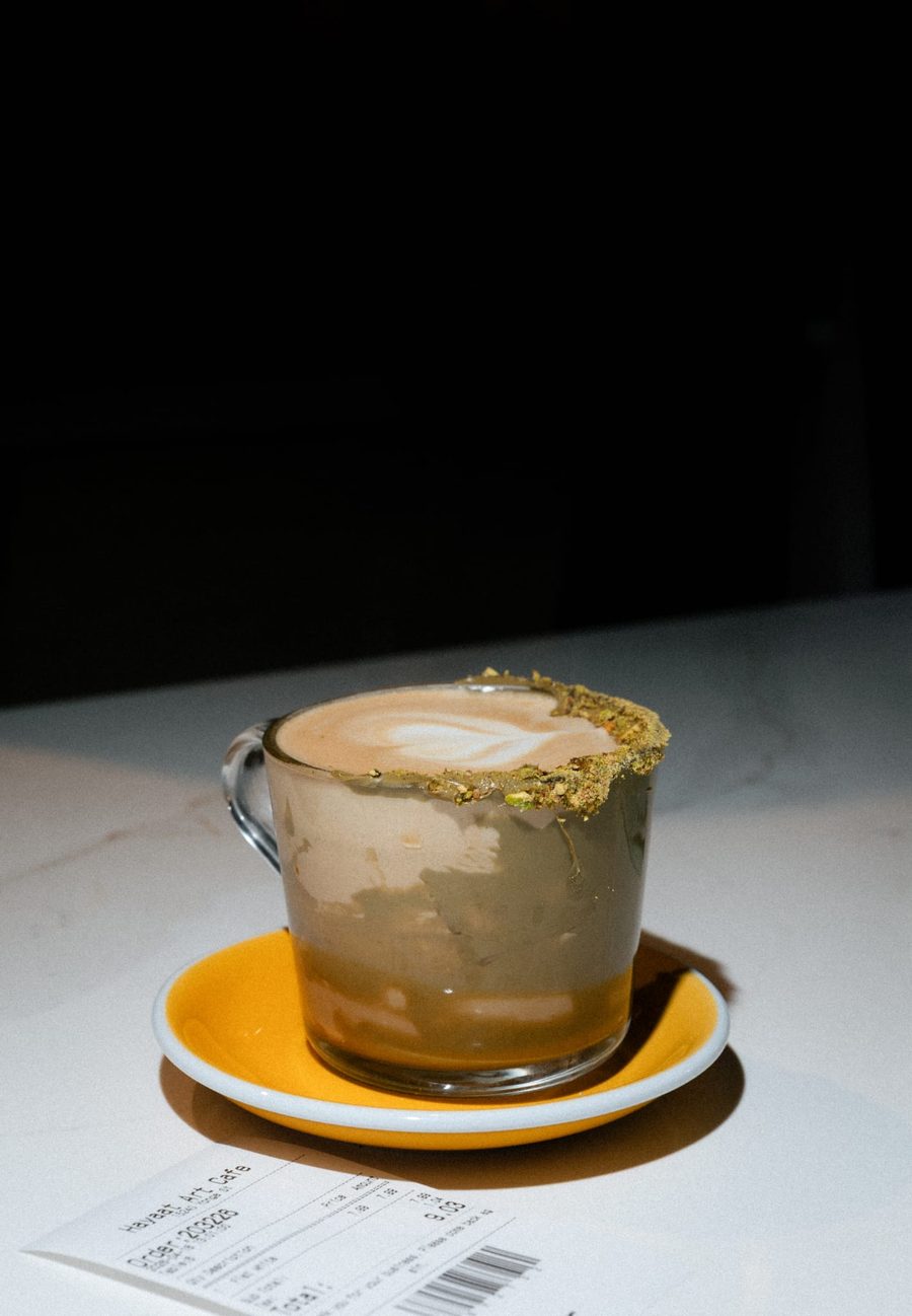 Pistachio latte with a crushed-pistachio rim